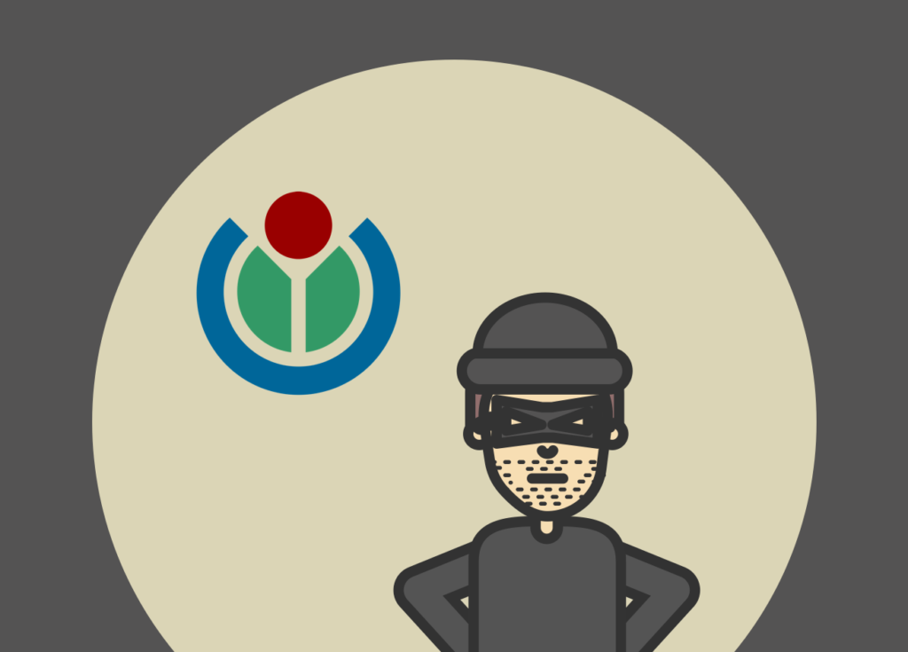Un bandido con antifaz sobre el logo de Wikimedia.